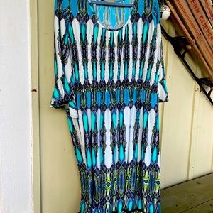 Hues of Turquoise, green, white, black dress.